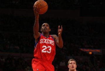 NEW YORK - OCTOBER 31:  Lou Williams #23 of the  the Philadelphia 76ers drives to the basket past David Lee #42 of the New York Knicks at Madison Square Garden on October 31, 2009 in New York, New York. NOTE TO USER: User expressly acknowledges and agrees that, by downloading and or using this photograph, User is consenting to the terms and conditions of the Getty Images License Agreement.  (Photo by Chris Trotman/Getty Images)