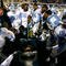 DURHAM, NC - NOVEMBER 29:  The North Carolina Tar Heels cheer as they ring the Victory Bell after defeating the Duke Blue Devils 28-20 at Wallace Wade Stadium on November 29, 2008 in Durham, North Carolina.  (Photo by Kevin C. Cox/Getty Images)
