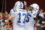 GLENDALE, AZ - SEPTEMBER 27: Wide receiver Pierre Garcon #85 of the Indianapolis Colts reacts with teammate Austin Collie #17 after Garcon makes a 53-yard touchdown catch against the Arizona Cardinals in the second quarter during the game at University of Phoenix Stadium on September 27, 2009 in Glendale, Arizona.  (Photo by Harry How/Getty Images)