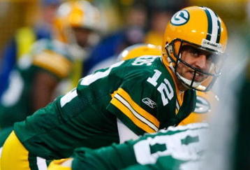 GREEN BAY, WI - NOVEMBER 01:  Quarterback Aaron Rodgers #12 of the Green Bay Packers calls out a play against the Minnesota Vikings during the second quarter of the game at Lambeau Field on November 1, 2009 in Green Bay, Wisconsin. (Photo by Scott Boehm/Getty Images)