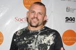 LAS VEGAS - OCTOBER 06:  UFC light heavyweight champion Chuck Liddell arrives at the Tangerine Lounge & Nightclub at the Treasure Island Hotel & Casino during the club's two-year anniversary party and the grand opening of the Social House restaurant October 6, 2006 in Las Vegas, Nevada.  (Photo by Ethan Miller/Getty Images)