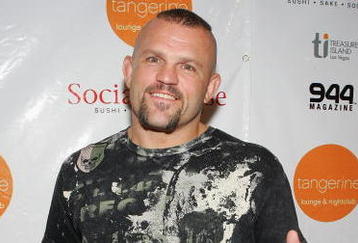 LAS VEGAS - OCTOBER 06:  UFC light heavyweight champion Chuck Liddell arrives at the Tangerine Lounge & Nightclub at the Treasure Island Hotel & Casino during the club's two-year anniversary party and the grand opening of the Social House restaurant October 6, 2006 in Las Vegas, Nevada.  (Photo by Ethan Miller/Getty Images)