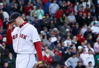 BOSTON - OCTOBER 11: Pitcher Jonathan Papelbon #58 of the Boston Red Sox reacts after being taken out of the game after blowing a save in the ninth inning against the Los Angeles Angels of Anaheim in Game Three of the ALDS during the 2009 MLB Playoffs at Fenway Park on October 11, 2009 in Boston, Massachusetts. The Angels defeated the Red Sox 7-6. (Photo by Jim Rogash/Getty Images)