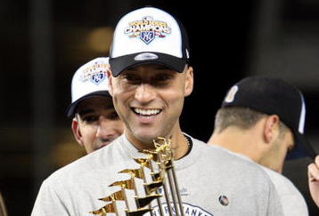 NEW YORK - NOVEMBER 04:  Derek Jeter #2 of the New York Yankees celebrates with the trophy after their 7-3 win against the Philadelphia Phillies in Game Six of the 2009 MLB World Series at Yankee Stadium on November 4, 2009 in the Bronx borough of New York City.  (Photo by Jed Jacobsohn/Getty Images)