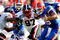 JACKSONVILLE, FL - OCTOBER 31:  Quarterback Tim Tebow #15 of the Florida Gators rushes upfield against Rennie Curran #35, Darryl Gamble #50 and Brandon Wood #97 of the Georgia Bulldogs at Jacksonville Municipal Stadium on October 31, 2009 in Jacksonville, Florida.  (Photo by Kevin C. Cox/Getty Images)