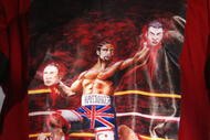 LONDON, ENGLAND - APRIL 20: A detail of the t-shirt worn by David Haye of the United Kingdom during a press conference at The Hospital Club on April 20, 2009 in London, England. The IBF, IBO and WBO World Heavyweight Championship fight between Wladimir Klitschko and David Haye will take place at the Veltins Arena on June 20, 2009 in Gelsenkirchen, Germany.  (Photo by Ryan Pierse/Getty Images)