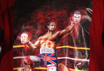 LONDON, ENGLAND - APRIL 20: A detail of the t-shirt worn by David Haye of the United Kingdom during a press conference at The Hospital Club on April 20, 2009 in London, England. The IBF, IBO and WBO World Heavyweight Championship fight between Wladimir Klitschko and David Haye will take place at the Veltins Arena on June 20, 2009 in Gelsenkirchen, Germany.  (Photo by Ryan Pierse/Getty Images)