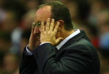LIVERPOOL, ENGLAND - AUGUST 19:  Liverpool Manager Rafael Benitez watches the action from the touchline during the Barclays Premier League match between Liverpool and Stoke City at Anfield on August 19, 2009 in Liverpool, England.  (Photo by Clive Brunskill/Getty Images)