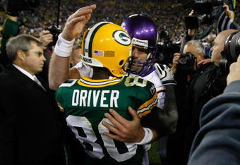 GREEN BAY, WI - NOVEMBER 1: Quarterback Brett Favre #4 of the Minnesota Vikings hugs a Donald Driver #80 of the Green Bay Packers at Lambeau Field on November 1, 2009 in Green Bay, Wisconsin. The Vikings defeated the Packers 38-26. (Photo by Scott Boehm/Getty Images)