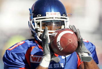 BOISE, ID - NOVEMBER 20:  Cornerback Austin Smith #37 of Boise State practices catching before facing Louisiana Tech at Bronco Stadium on November 20, 2004 in Boise, Idaho. Boise State defeated Louisiana Tech 55-14. (Photo by Jeff Gross/Getty Images)