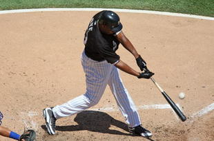 CHICAGO - JUNE 28: Jermaine Dye #23 of the Chicago White Sox hits the ball against the Chicago Cubs on June 28, 2009 at U.S. Cellular Field in Chicago, Illinois. The White Sox defeated the Cubs 6-0. (Photo by Jonathan Daniel/Getty Images)