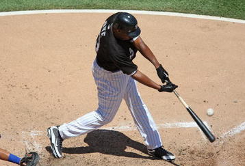 CHICAGO - JUNE 28: Jermaine Dye #23 of the Chicago White Sox hits the ball against the Chicago Cubs on June 28, 2009 at U.S. Cellular Field in Chicago, Illinois. The White Sox defeated the Cubs 6-0. (Photo by Jonathan Daniel/Getty Images) 