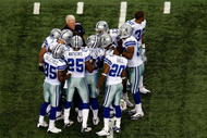 ARLINGTON, TX - NOVEMBER 01:  Head coach Wade Phillips of the Dallas Cowboys with his team at Cowboys Stadium on November 1, 2009 in Arlington, Texas.  (Photo by Ronald Martinez/Getty Images)