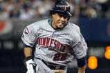 NEW YORK - OCTOBER 09:  Carlos Gomez #22 of the Minnesota Twins runs against the New York Yankees in Game Two of the ALDS during the 2009 MLB Playoffs at Yankee Stadium on October 9, 2009 in the Bronx borough of New York City.  (Photo by Jim McIsaac/Getty Images)