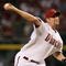 PHOENIX - APRIL 06:  Starting pitcher Brandon Webb #17 of the Arizona Diamondbacks pitches against the Colorado Rockies during the MLB openning day game at Chase Field on April 6, 2009 in Phoenix, Arizona.  The Diamondbacks defeated the Rockies 9-8.  (Photo by Christian Petersen/Getty Images)