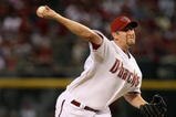 PHOENIX - APRIL 06:  Starting pitcher Brandon Webb #17 of the Arizona Diamondbacks pitches against the Colorado Rockies during the MLB openning day game at Chase Field on April 6, 2009 in Phoenix, Arizona.  The Diamondbacks defeated the Rockies 9-8.  (Photo by Christian Petersen/Getty Images)
