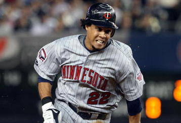 NEW YORK - OCTOBER 09:  Carlos Gomez #22 of the Minnesota Twins runs against the New York Yankees in Game Two of the ALDS during the 2009 MLB Playoffs at Yankee Stadium on October 9, 2009 in the Bronx borough of New York City.  (Photo by Jim McIsaac/Getty Images)