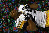TAMPA, FL - FEBRUARY 01:  Ryan Clark #25 of the Pittsburgh Steelers lies on the field as he celebrates their 27-23 win against the Arizona Cardinals during Super Bowl XLIII on February 1, 2009 at Raymond James Stadium in Tampa, Florida.  (Photo by Chris McGrath/Getty Images)