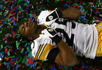 TAMPA, FL - FEBRUARY 01:  Ryan Clark #25 of the Pittsburgh Steelers lies on the field as he celebrates their 27-23 win against the Arizona Cardinals during Super Bowl XLIII on February 1, 2009 at Raymond James Stadium in Tampa, Florida.  (Photo by Chris McGrath/Getty Images)