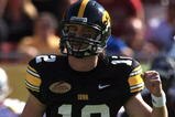 TAMPA, FL - JANUARY 01:  Ricky Stanzi #12 of the Iowa Hawkeyes celebrates a touchdown pass against the South Carolina Gamecocks during the Outback Bowl on January 1, 2009 at Raymond James Stadium in Tampa, Florida.  (Photo by Scott Halleran/Getty Images)