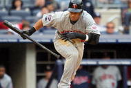 NEW YORK - MAY 17: Carlos Gomez #22 of the Minnesota Twins bats against the New York Yankees on May 17, 2009 at Yankee Stadium in the Bronx borough of New York City. The Yankees defeated the Twins 3-2 in ten innings. (Photo by Jim McIsaac/Getty Images)