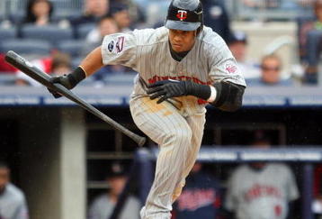 NEW YORK - MAY 17:  Carlos Gomez #22 of the Minnesota Twins bats against the New York Yankees on May 17, 2009 at Yankee Stadium in the Bronx borough of New York City. The Yankees defeated the Twins 3-2 in ten innings.  (Photo by Jim McIsaac/Getty Images)