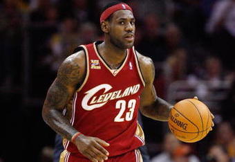 CLEVELAND - OCTOBER 27:  LeBron James #23 of the Cleveland Cavaliers brings the ball up court during the game against the Boston Celtics on October 27, 2009 at Quicken Loans Arena in Cleveland, Ohio.  The Celtics won 95-89.  NOTE TO USER: User expressly acknowledges and agrees that, by downloading and or using this photograph, User is consenting to the terms and conditions of the Getty Images License Agreement. (Photo by Gregory Shamus/Getty Images)