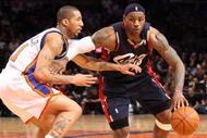 NEW YORK - FEBRUARY 04:  LeBron James #23 of the Cleveland Cavaliers drives the ball to the basket against Wilson Chandler #21 of the New York Knicks on February 4, 2009 at Madison Square Garden in New York City. NOTE TO USER: User expressly acknowledges and agrees that, by downloading and or using this photograph, User is consenting to the terms and conditions of the Getty Images License Agreement.  (Photo by Nick Laham/Getty Images)