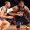 NEW YORK - FEBRUARY 04:  LeBron James #23 of the Cleveland Cavaliers drives the ball to the basket against Wilson Chandler #21 of the New York Knicks on February 4, 2009 at Madison Square Garden in New York City. NOTE TO USER: User expressly acknowledges and agrees that, by downloading and or using this photograph, User is consenting to the terms and conditions of the Getty Images License Agreement.  (Photo by Nick Laham/Getty Images)