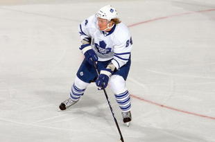 BUFFALO, NY - OCTOBER 30:  Mikhail Grabovski #84of the Toronto Maple Leafs skates against the Buffalo Sabres at HSBC Arena on October 30, 2009 in Buffalo, New York. (Photo by Rick Stewart/Getty Images)