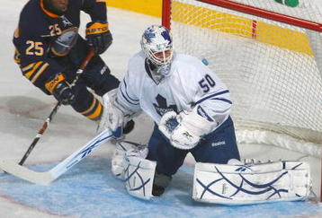 BUFFALO, NY - OCTOBER 30:  Goalie Jonas Gustavsson #50 of the Toronto Maple Leafs guards the net against Michael Grier #25 of the Buffalo Sabres at HSBC Arena on October 30, 2009 in Buffalo, New York. (Photo by Rick Stewart/Getty Images)