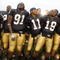 SOUTH BEND, IN - SEPTEMBER 13: Golden Tate #23, Pat Kuntz #96, Asaph Schwapp #44, George West #19, David Grimes #11, Emeka Nwankwo #91 and Terrail Lambert #20 of the Notre Dame Fighting Irish celebrate after a 35-17 victory over the Michigan Wolverines on September 13, 2008 at Notre Dame Stadium in South Bend, Indiana.  (Photo by Gregory Shamus/Getty Images)