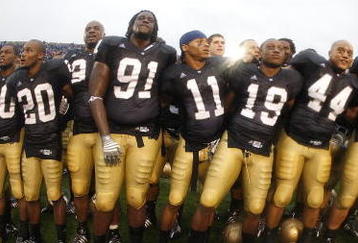 SOUTH BEND, IN - SEPTEMBER 13: Golden Tate #23, Pat Kuntz #96, Asaph Schwapp #44, George West #19, David Grimes #11, Emeka Nwankwo #91 and Terrail Lambert #20 of the Notre Dame Fighting Irish celebrate after a 35-17 victory over the Michigan Wolverines on September 13, 2008 at Notre Dame Stadium in South Bend, Indiana.  (Photo by Gregory Shamus/Getty Images)
