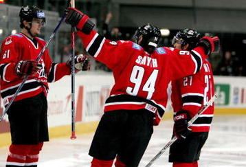INNSBRUCK, AUSTRIA - MAY 05:  Rick Nash #61 of Canada celebrates his goal with teammates Ryan Smyth #94 and Dan Boyle #27 in the second period against the USA in the IIHF World Men's Championships preliminary round game at the Olympic Hall on May 5, 2005 in Innsbruck, Austria.  (Photo by Jeff Gross/Getty Images)