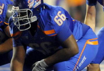 BOISE, ID - SEPTEMBER 3: Quarterback Kellen Moore #6 of the Boise State Broncos barks out signals as center Thomas Byrd #66 of the Boise State Broncos waits to snap the ball in the third quarter of the game against the Oregon Ducks at Bronco Stadium on September 3, 2009 in Boise, Idaho. Boise State won the game 19-8. (Photo by Steve Dykes/Getty Images)