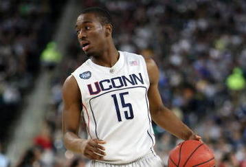 DETROIT - APRIL 04:  Kemba Walker #15 of the Connecticut Huskies moves the ball against the Michigan State Spartans during the National Semifinal game of the NCAA Division I Men's Basketball Championship at Ford Field on April 4, 2009 in Detroit, Michigan.  (Photo by Gregory Shamus/Getty Images)