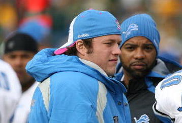 GREEN BAY, WI - OCTOBER 18:  Injured quarterback Matthew Stafford #9 of the Detroit Lions talks with teammates on the sidelines during a game against the Green Bay Packers at Lambeau Field on October 18, 2009 in Green Bay, Wisconsin. The Packers defeated the Lions 26-0. (Photo by Jonathan Daniel/Getty Images)