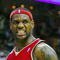 CLEVELAND - OCTOBER 27:  LeBron James #23 of the Cleveland Cavaliers reacts during the season opener against the Boston Celtics at Quicken Loans Arena on October 27, 2009 in Cleveland, Ohio.  NOTE TO USER: User expressly acknowledges and agrees that, by downloading and or using this photograph, User is consenting to the terms and conditions of the Getty Images License Agreement. (Photo by Gregory Shamus/Getty Images)