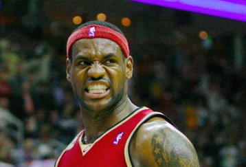 CLEVELAND - OCTOBER 27:  LeBron James #23 of the Cleveland Cavaliers reacts during the season opener against the Boston Celtics at Quicken Loans Arena on October 27, 2009 in Cleveland, Ohio.  NOTE TO USER: User expressly acknowledges and agrees that, by downloading and or using this photograph, User is consenting to the terms and conditions of the Getty Images License Agreement. (Photo by Gregory Shamus/Getty Images)