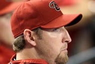 PHOENIX - APRIL 10: Pitcher Brandon Webb #17 of the Arizona Diamondbacks looks on during the game against the Los Angeles Dodgers at Chase Field on April 10, 2009 in Phoenix, Arizona. The Diamondbacks defeated the Dodgers 9-4. (Photo by Christian Petersen/Getty Images)