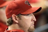 PHOENIX - APRIL 10:  Pitcher Brandon Webb #17 of the Arizona Diamondbacks looks on during the game  against the Los Angeles Dodgers at Chase Field on April 10, 2009 in Phoenix, Arizona. The Diamondbacks defeated the Dodgers 9-4.  (Photo by Christian Petersen/Getty Images)
