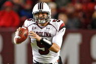 TUSCALOOSA - OCTOBER 17:  Quarterback Stephen Garcia #9 of the South Carolina Gamecocks rolls out and looks downfield during the game against the Alabama Crimson Tide at Bryant-Denny Stadium on October 17, 2009 in Tuscaloosa, Alabama.  The Crimson Tide beat the Gamecocks 20-6.  (Photo by Mike Zarrilli/Getty Images)
