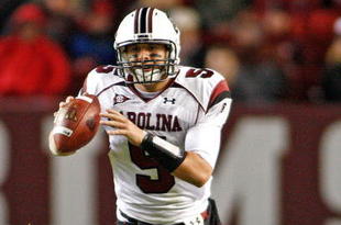 TUSCALOOSA - OCTOBER 17: Quarterback Stephen Garcia #9 of the South Carolina Gamecocks rolls out and looks downfield during the game against the Alabama Crimson Tide at Bryant-Denny Stadium on October 17, 2009 in Tuscaloosa, Alabama. The Crimson Tide beat the Gamecocks 20-6. (Photo by Mike Zarrilli/Getty Images)