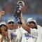 MIAMI GARDENS, FL - FEBRUARY 04: Bob Sanders #21 of the Indianapolis Colts celebrates with the Vince Lombardi Trophy, next to head coach Tony Dungy and his wife Lauren Dungy, after the Colts 29-17 win against the Chicago Bears in Super Bowl XLI on February 4, 2007 at Dolphin Stadium in Miami Gardens, Florida. (Photo by Jonathan Daniel/Getty Images)