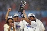 MIAMI GARDENS, FL - FEBRUARY 04:  Bob Sanders #21 of  the Indianapolis Colts celebrates with the Vince Lombardi Trophy, next to head coach Tony Dungy and his wife Lauren Dungy, after the Colts 29-17 win against the Chicago Bears in Super Bowl XLI on February 4, 2007 at Dolphin Stadium in Miami Gardens, Florida.  (Photo by Jonathan Daniel/Getty Images)