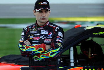 FORT WORTH, TX - NOVEMBER 06:  Jeff Gordon, driver of the #24 DuPont Chevrolet, stands on pit road after qualifying for the NASCAR Sprint Cup Series Dickies 500 at Texas Motor Speedway on November 6, 2009 in Fort Worth, Texas.  (Photo by John Harrelson/Getty Images for NASCAR)