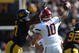 BERKELEY, CA - OCTOBER 24:  Jeff Tuel #10 of the Washington State Cougars passes against Cameron Jordan #97 of the California Golden Bears at California Memorial Stadium on October 24, 2009 in Berkeley, California.  (Photo by Jed Jacobsohn/Getty Images)