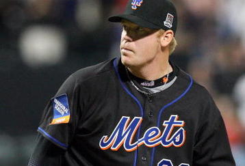 NEW YORK - MAY 08:  J.J. Putz #22 of the New York Mets throws a pitch against the Pittsburgh Pirates on May 8, 2009 at Citi Field in the Flushing neighborhood of the Queens borough of New York City. The Mets defeated the Pirates 7-3.  (Photo by Jim McIsaac/Getty Images)
