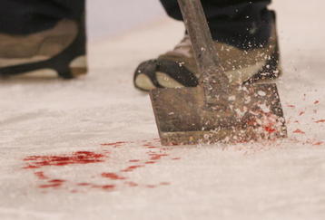 PITTSBURGH - MAY 04: Blood is removed from the ice after an injury to Chris Drury #23 of the New York Rangers in his game against the Pittsburgh Penguins in game five of the Eastern Conference Semifinals of the 2008 NHL Stanley Cup Playoffs on May 4, 2008 at the Mellon Arena in Pittsburgh, Pennsylvania. (Photo by Bruce Bennett/Getty Images)