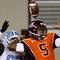 BLACKSBURG, VA - OCTOBER 29:  Quarterback Tyrod Taylor #5 of the Virginia Tech University Hokies is defended by E.J. Wilson #92 of the North Carolina Tar Heels during the  game at Lane Stadium on October 29, 2009 in Blacksburg, Virginia.  (Photo by Scott Halleran/Getty Images)
